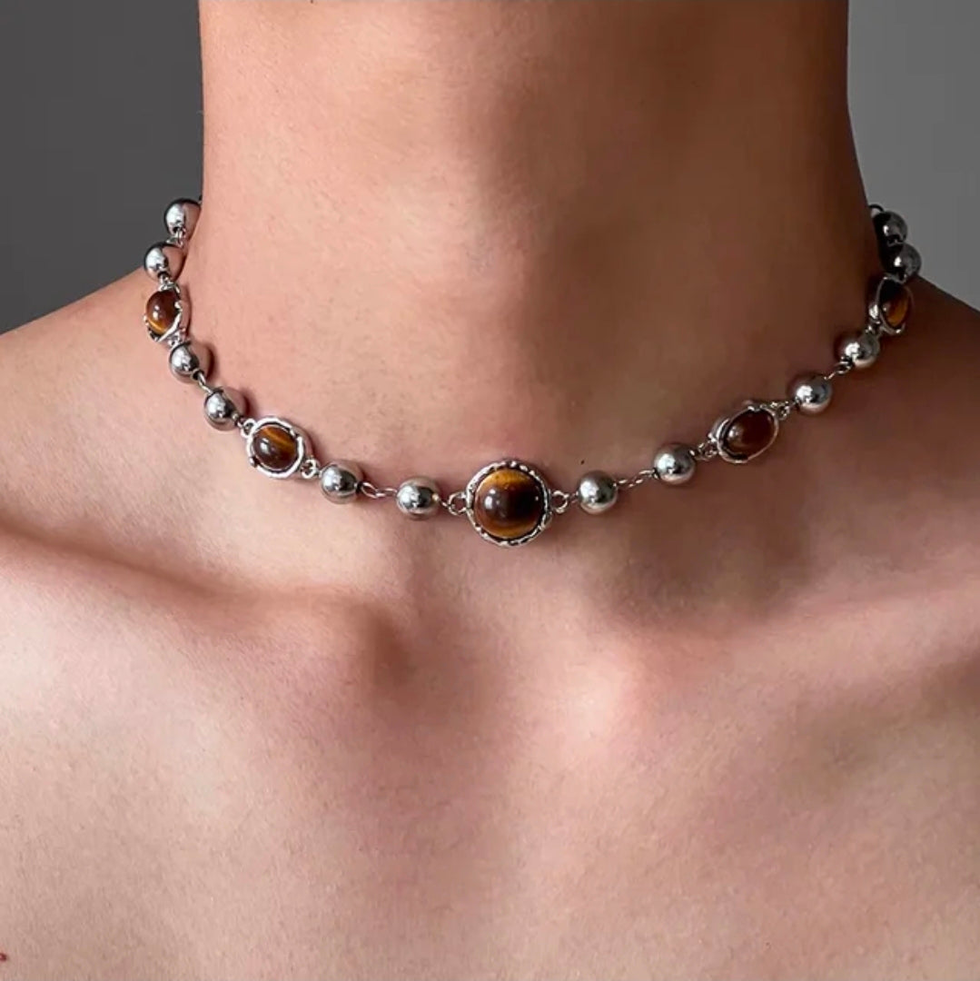 silver and brown choker