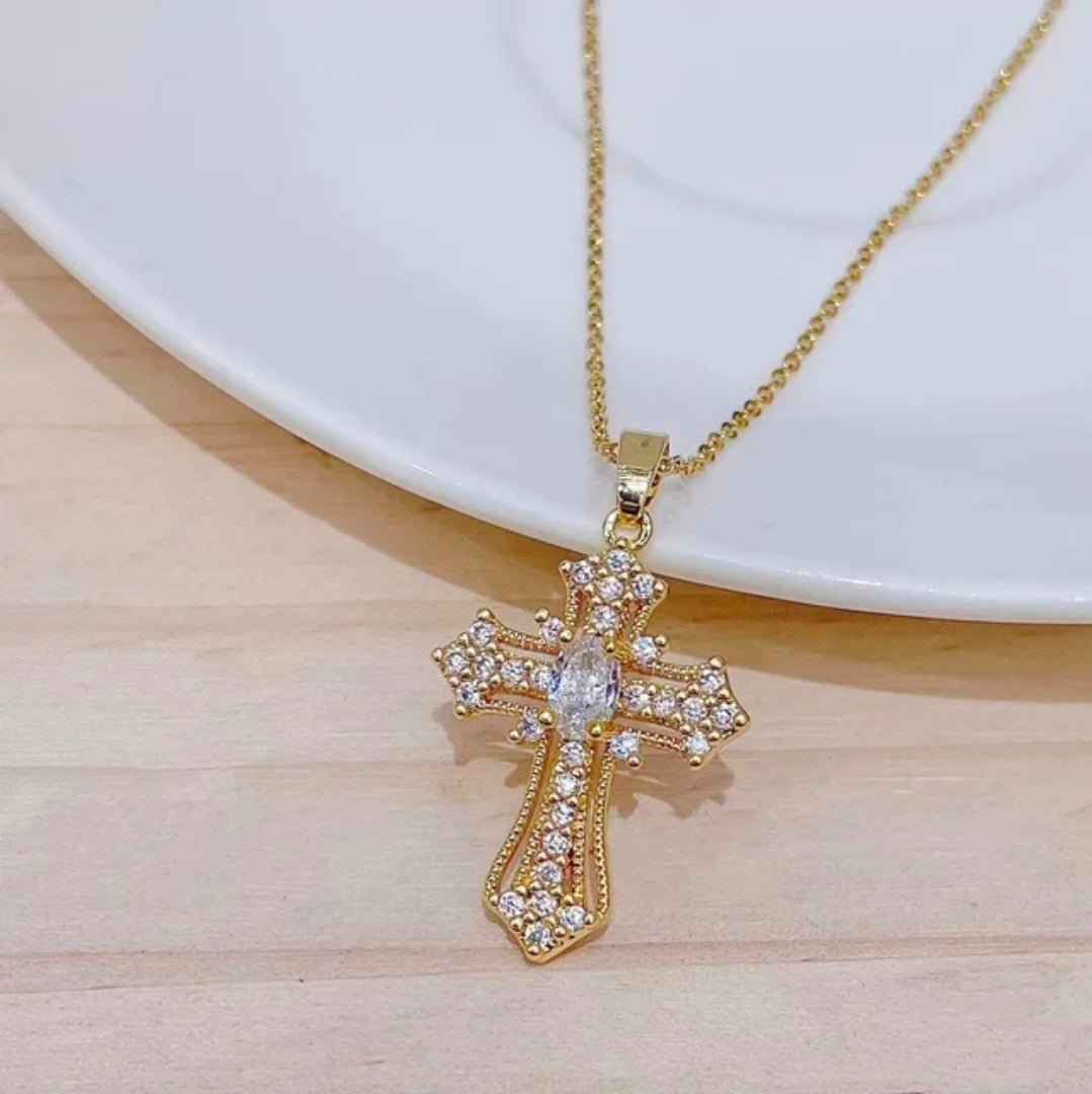 gold and silver cross necklace
